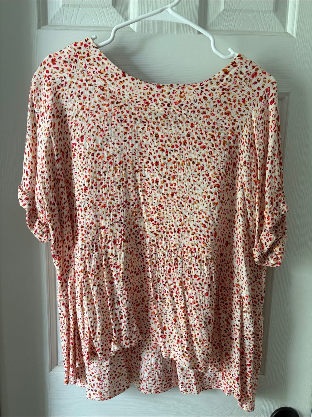 Cream Floral Short-Sleeve Peplum Tunic with Red Accent